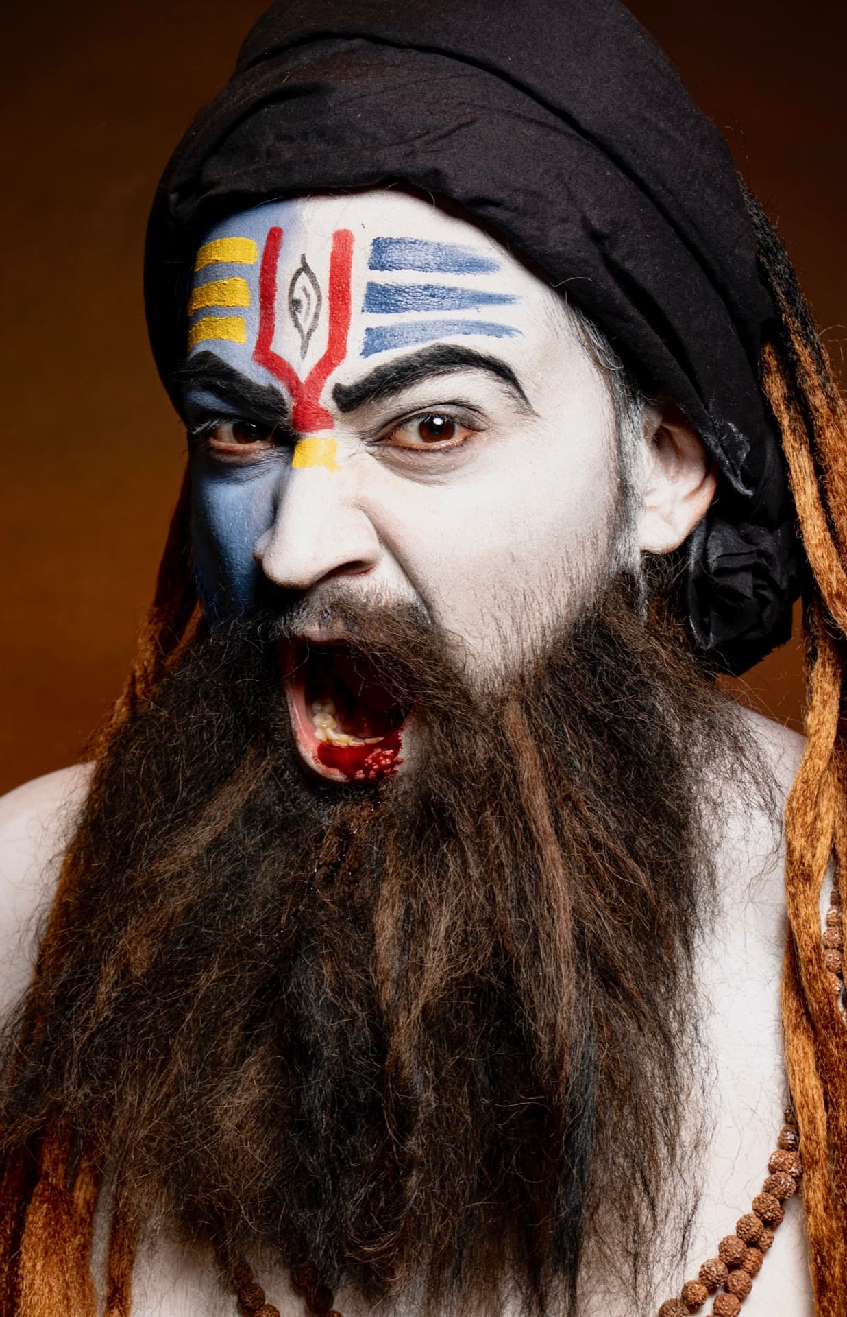 Character body paint inspired by traditional Sadhu face art